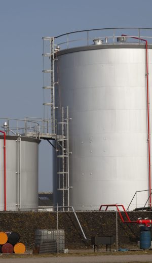 oil tanks with blue sky